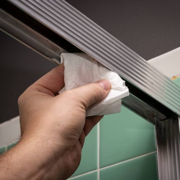 A person holding a tissue in their hand.